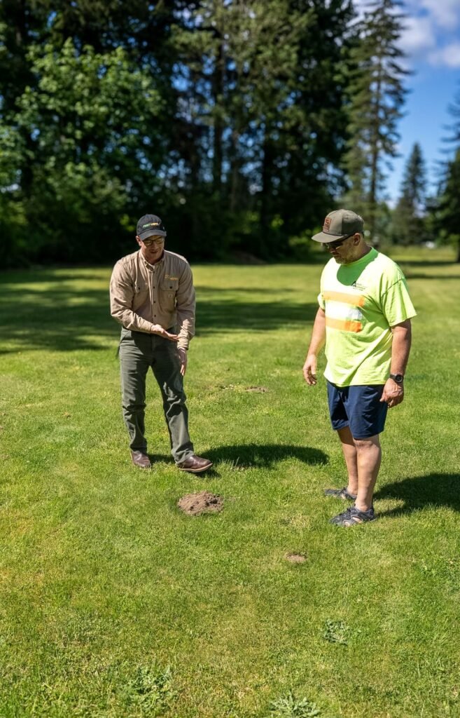 Pest Near technician performing pest control service at an Everett WA home
